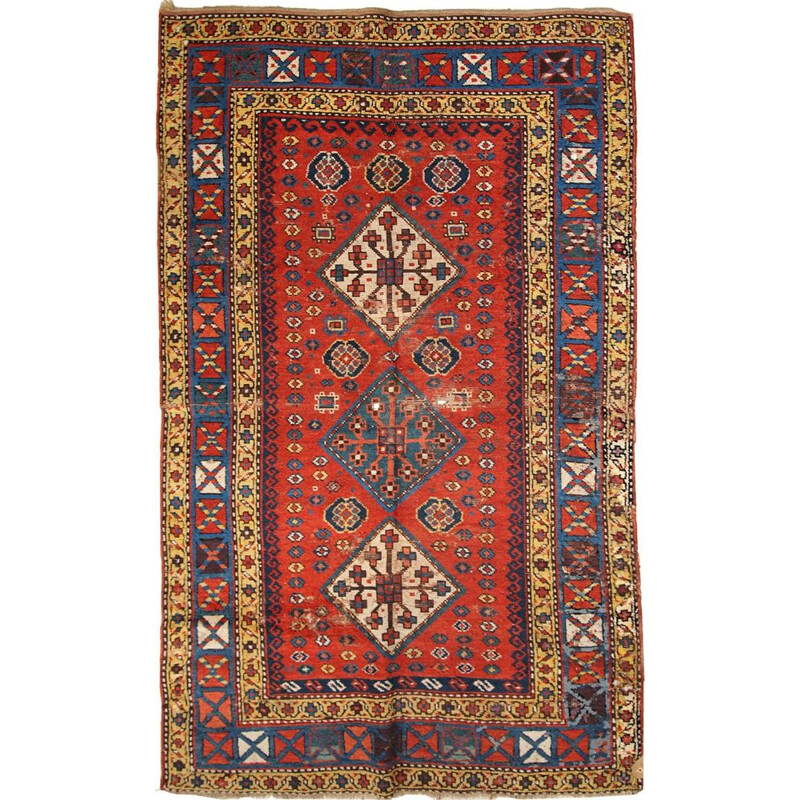 Tapis vintage artisanal Kazak Caucase tons rouge bleu et jaune