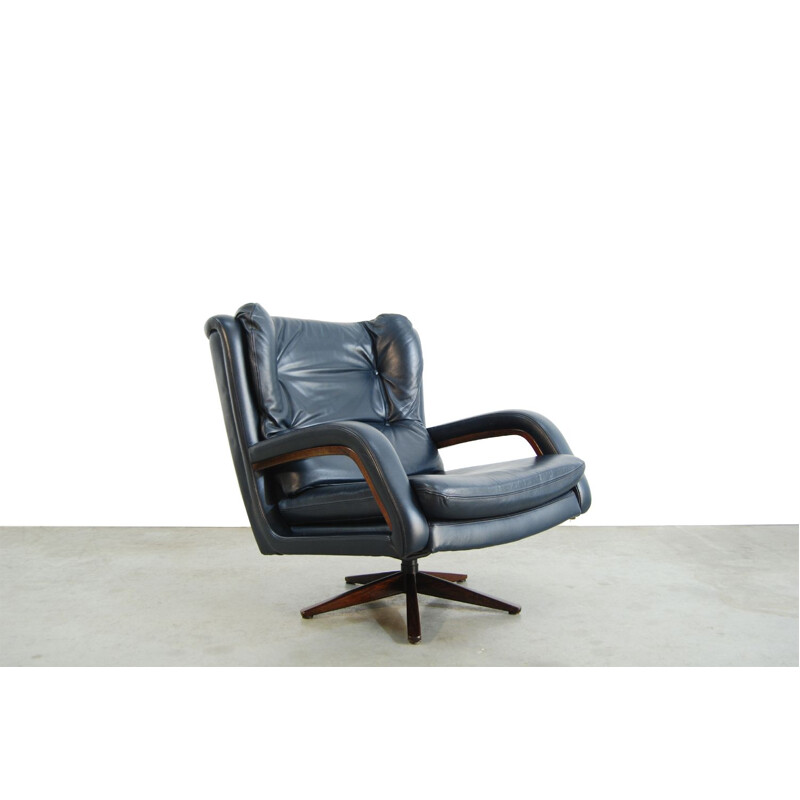 Vintage leather swivel armchair