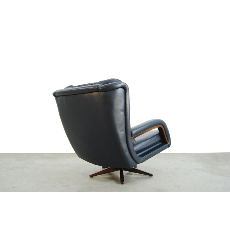Vintage leather swivel armchair