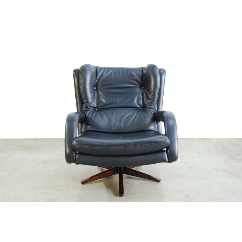 Vintage leather swivel armchair