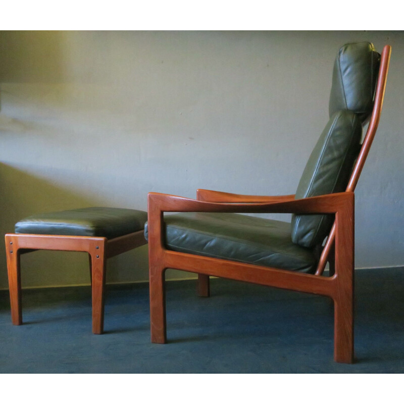Vintage Niels Eilersen lounge chair and ottoman in solid teak and leather