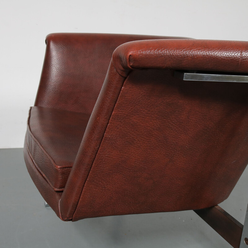 Vintage leather lounge chair by Geoffrey Harcourt