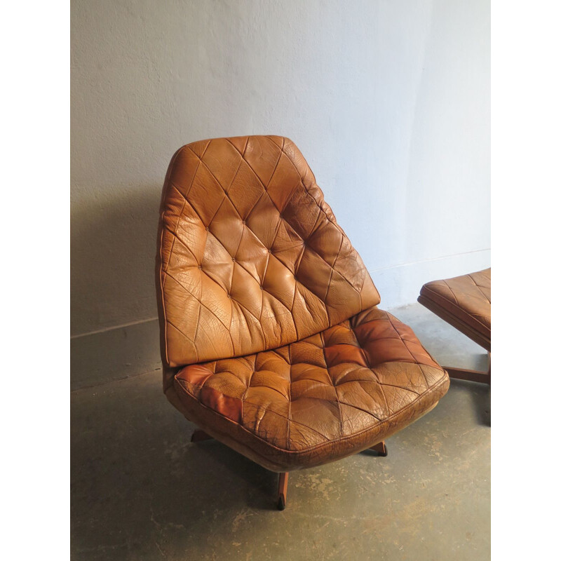 Vintage lounge chair with ottoman in leather, suede and teak