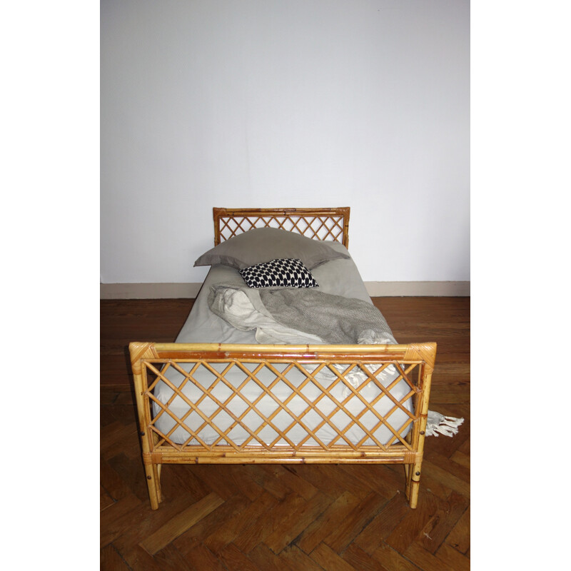 Vintage French bed in rattan