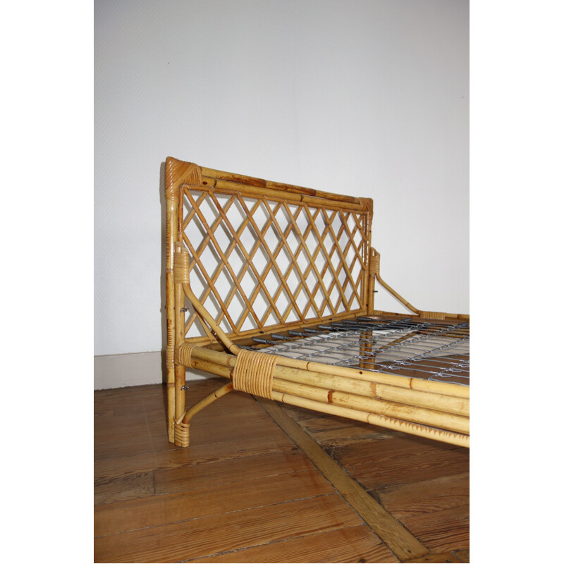 Vintage French bed in rattan