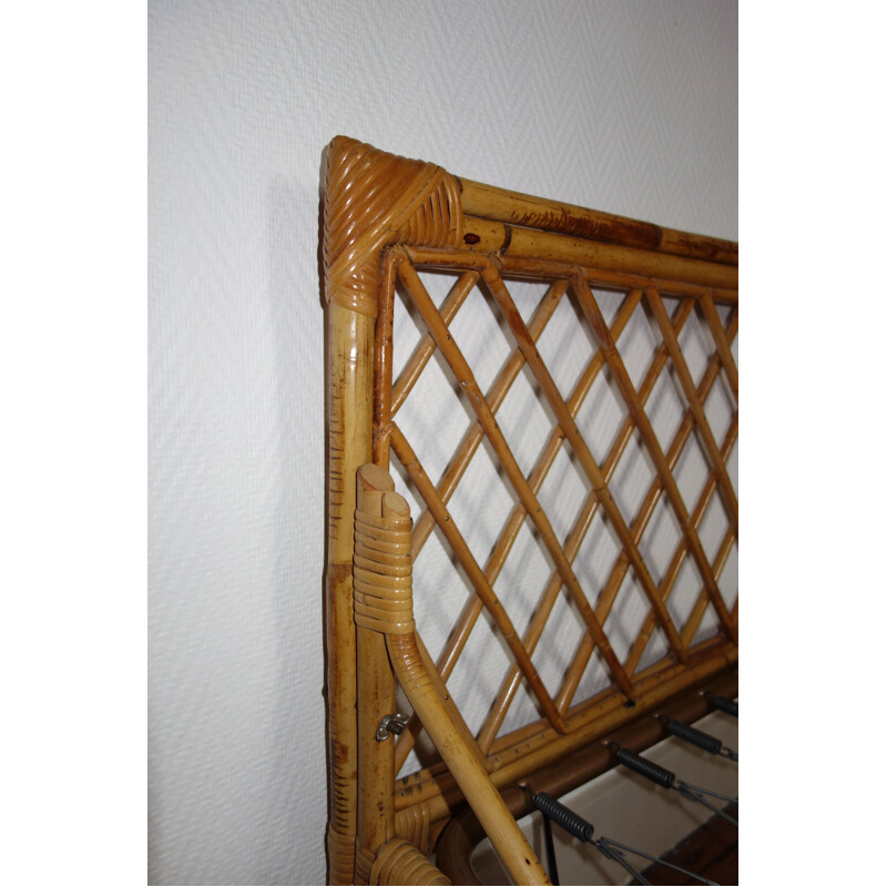 Vintage French bed in rattan