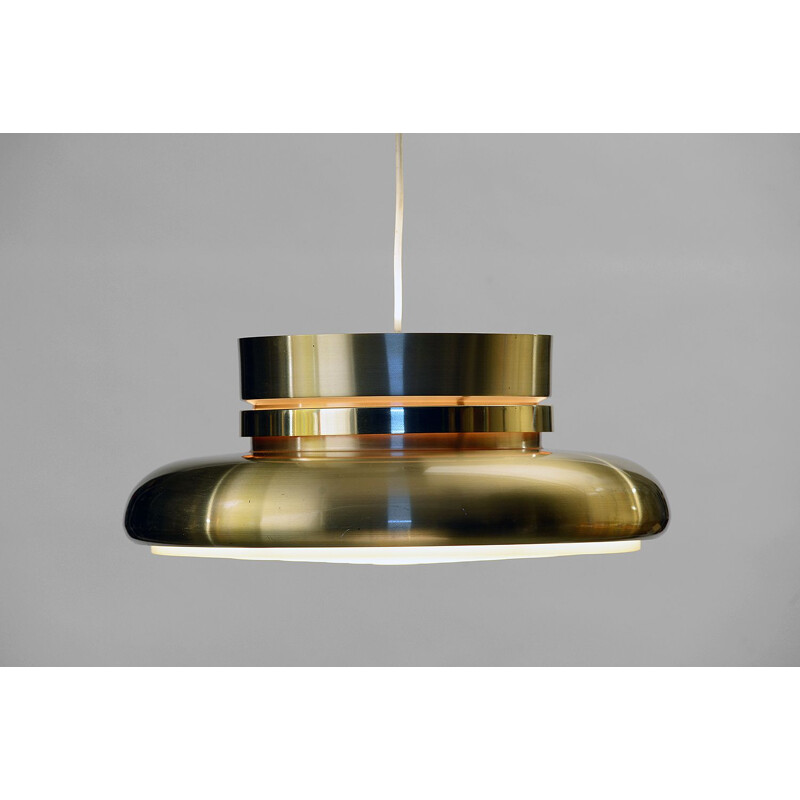 Vintage pendant light in gold aluminum by Carl Thore