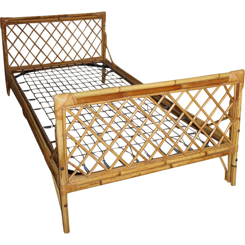 Vintage French bed in rattan