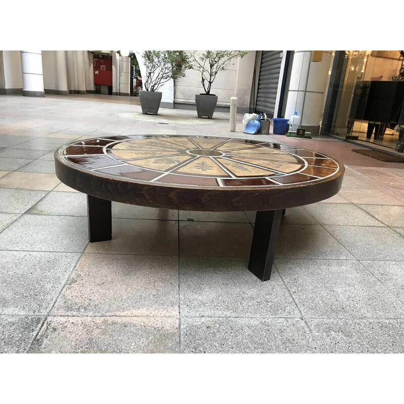 Vintage oval coffee table by Roger Capron