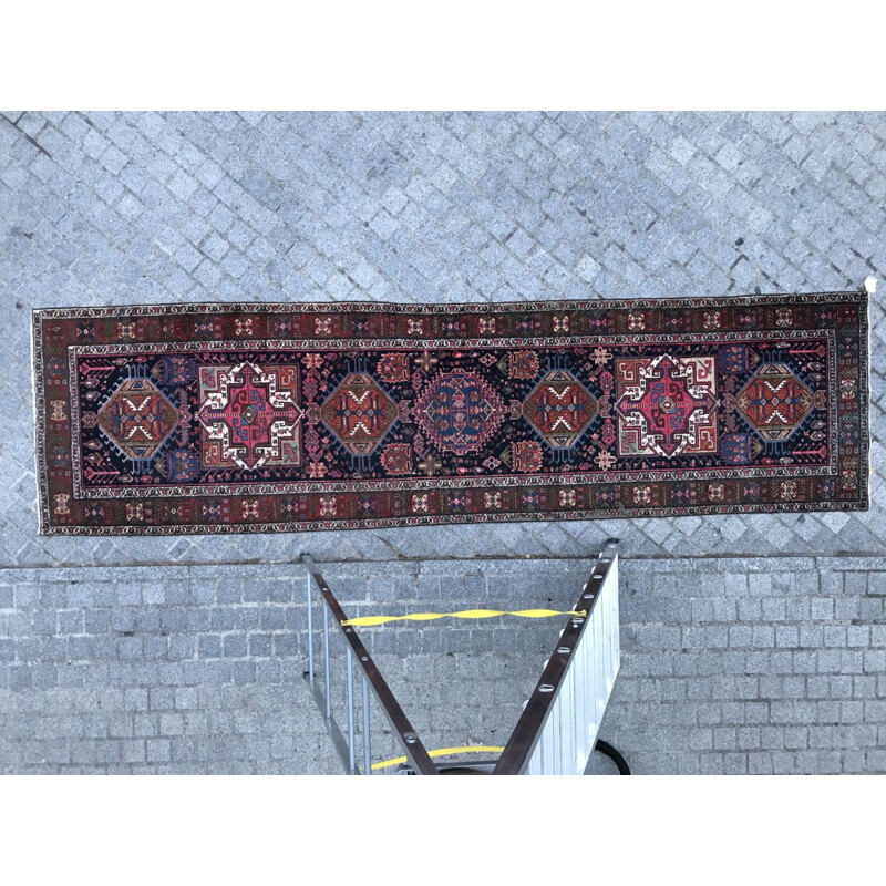 Vintage Persian carpet made of wool