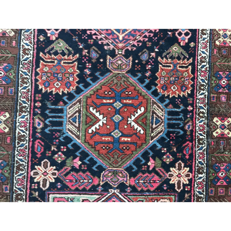 Vintage Persian carpet made of wool