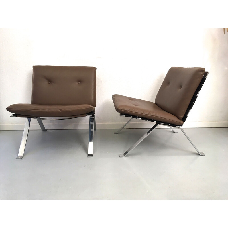 Pair of vintage low chairs without arms by Hans Eichenberger in leatherette and chrome steel