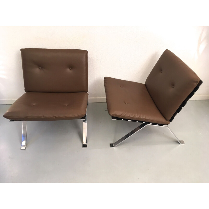 Pair of vintage low chairs without arms by Hans Eichenberger in leatherette and chrome steel