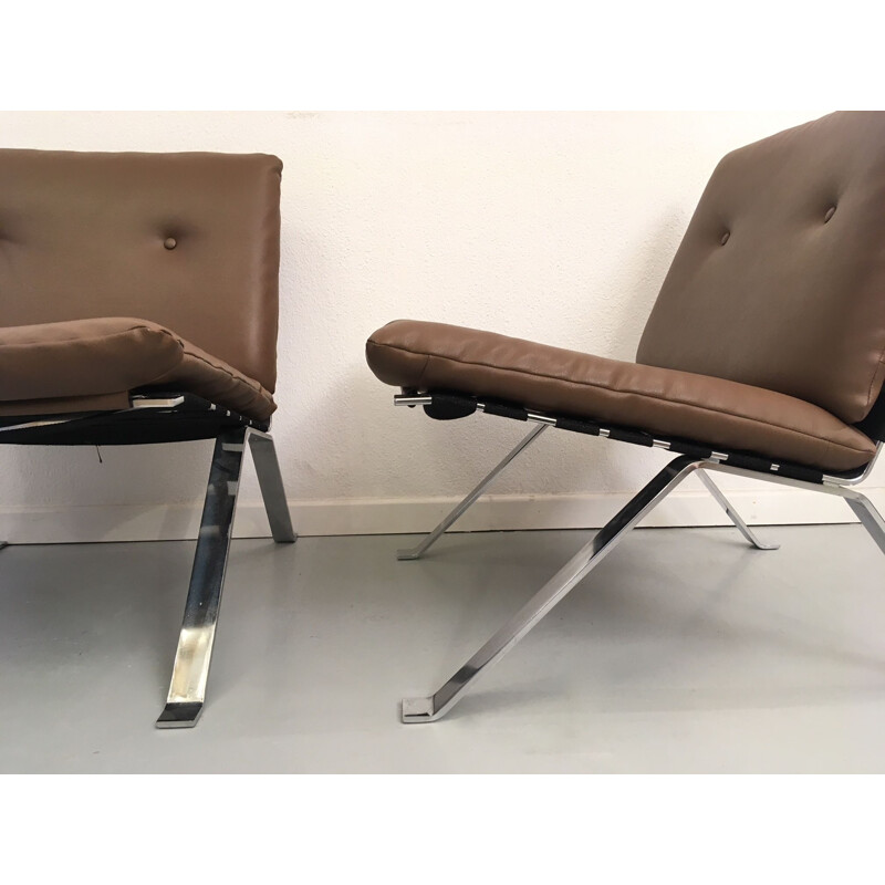 Pair of vintage low chairs without arms by Hans Eichenberger in leatherette and chrome steel