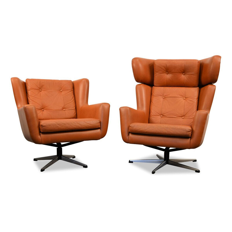 Set of 2 swiveling leather amrchairs by Skjold Sorensen
