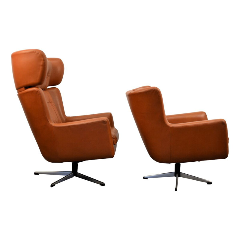 Set of 2 swiveling leather amrchairs by Skjold Sorensen