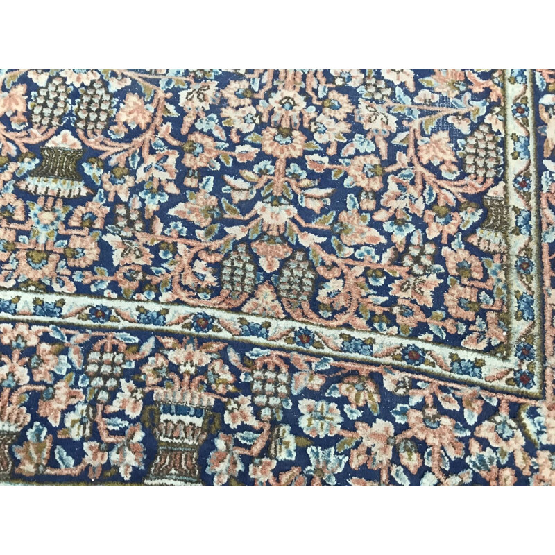 Vintage blue Persian carpet in cotton