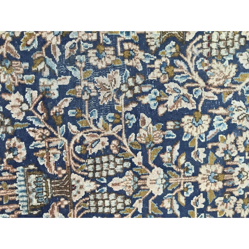 Vintage blue Persian carpet in cotton