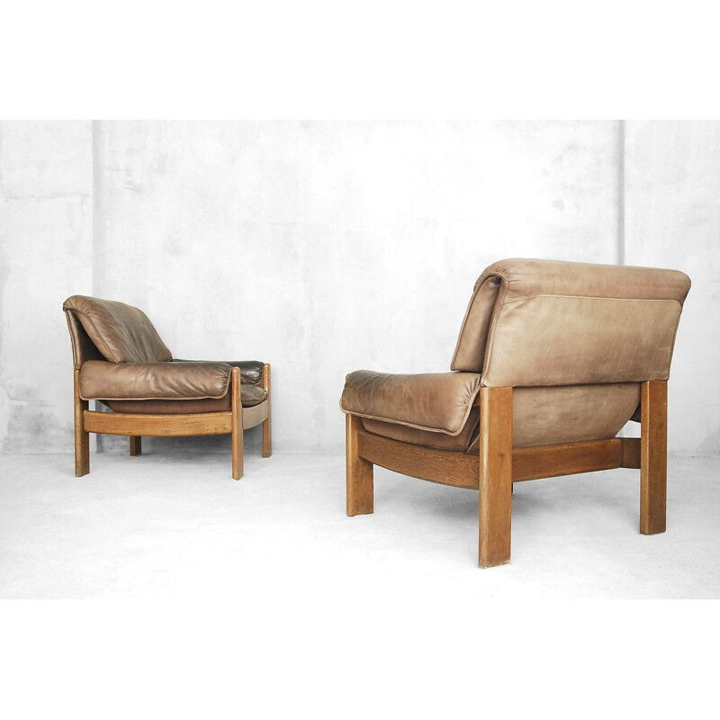 Set of 2 vintage Danish armchairs in leather