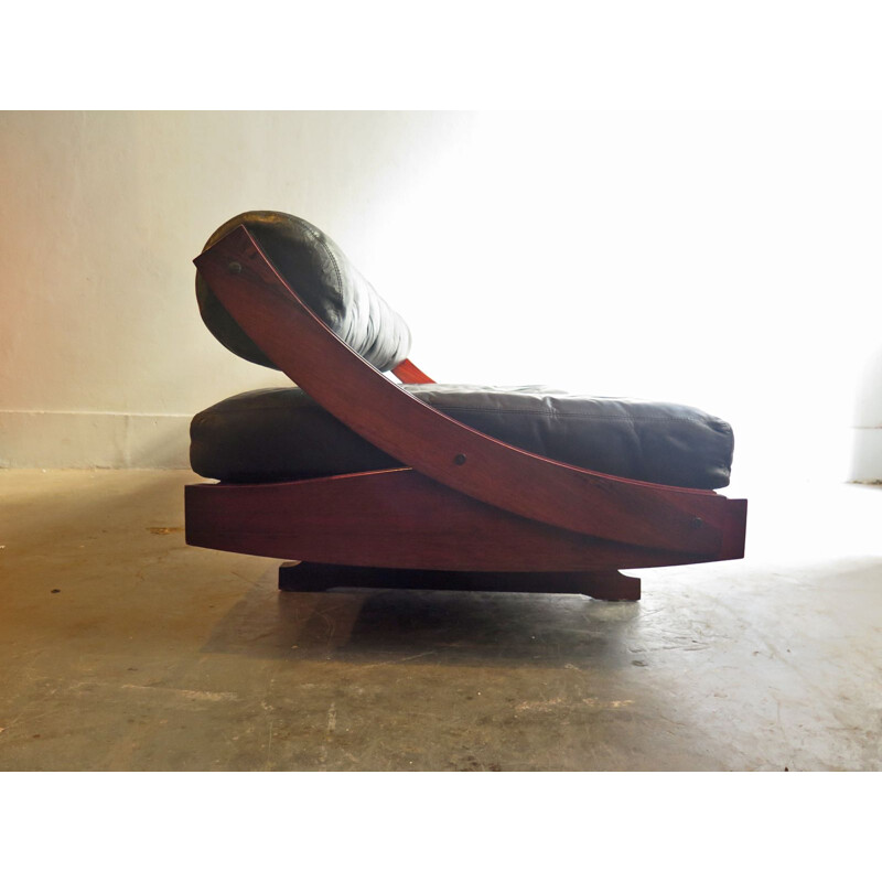 Vintage sofa bed in rosewood and leather by Gianni Songia