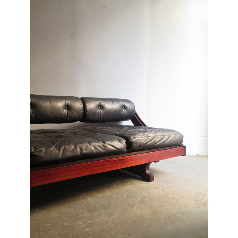 Vintage sofa bed in rosewood and leather by Gianni Songia