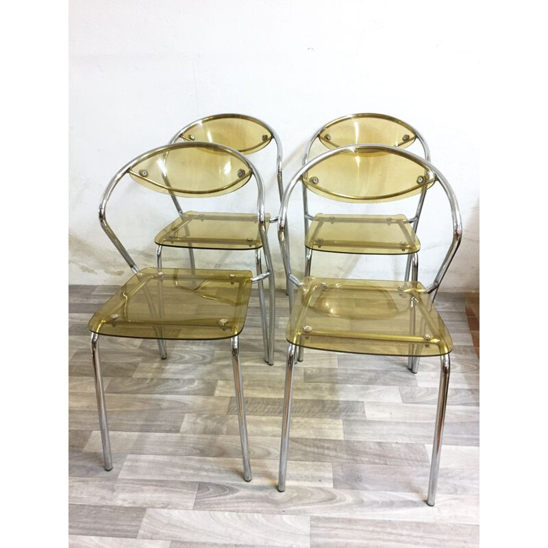 Set of 4 vintage plexiglas and chrome chairs 1980