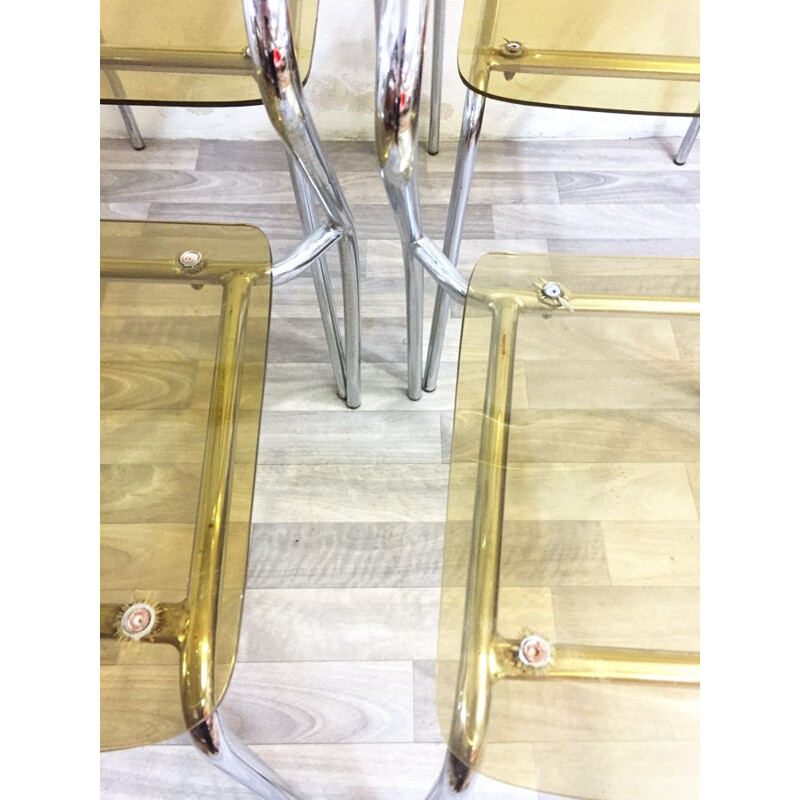 Set of 4 vintage plexiglas and chrome chairs 1980