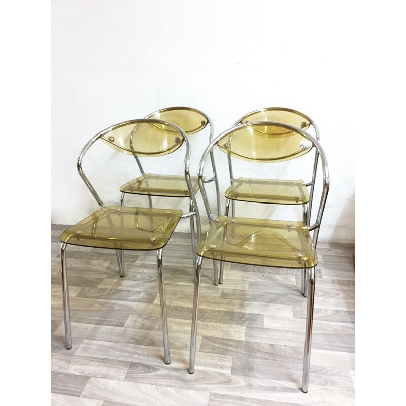 Set of 4 vintage plexiglas and chrome chairs 1980