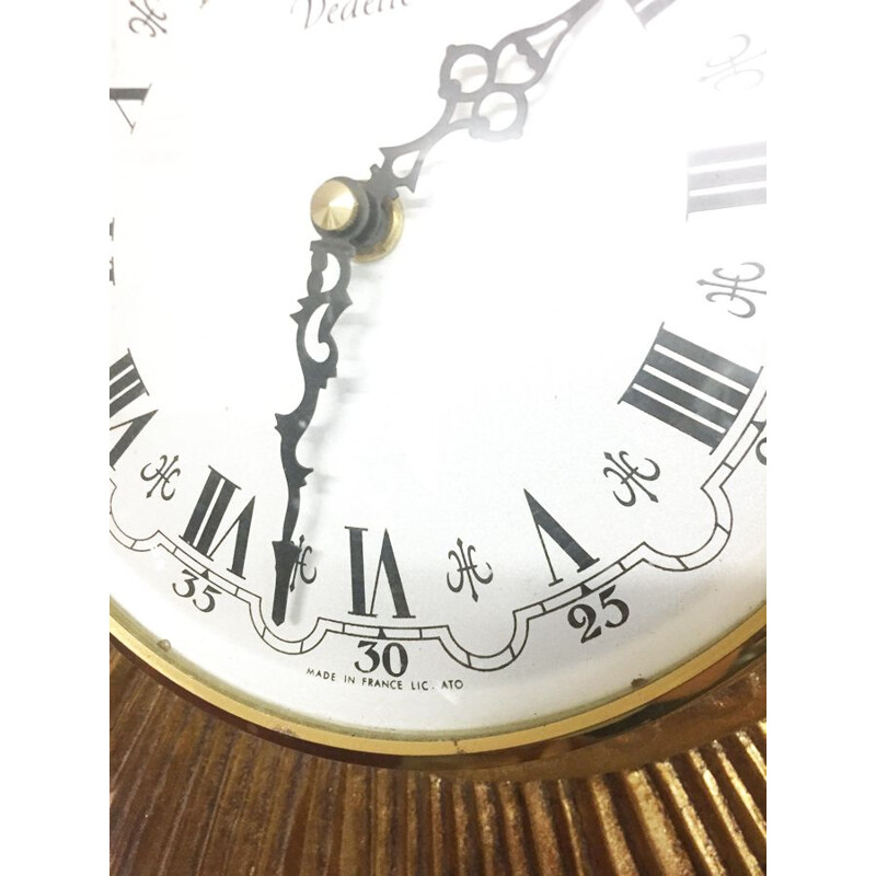 Horloge vedette vintage soleil
