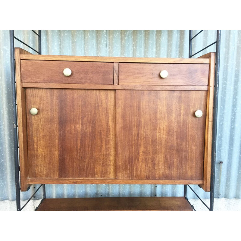 Vintage flexible string cabinet in oak
