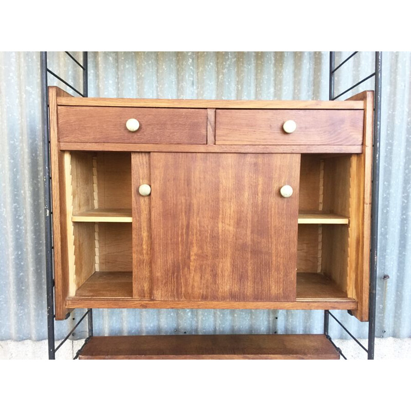 Vintage flexible string cabinet in oak