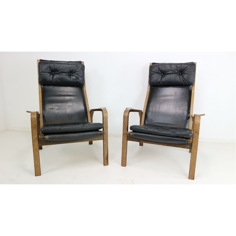 Pair of vintage scandinavian armchairs for Yngve Ekström in black leather 1960