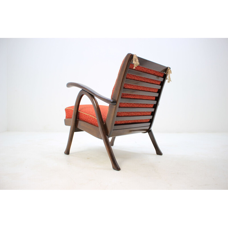 Vintage orange armchair by Thonet