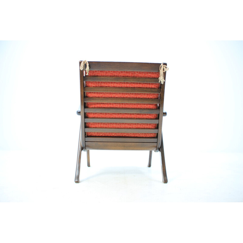 Vintage orange armchair by Thonet