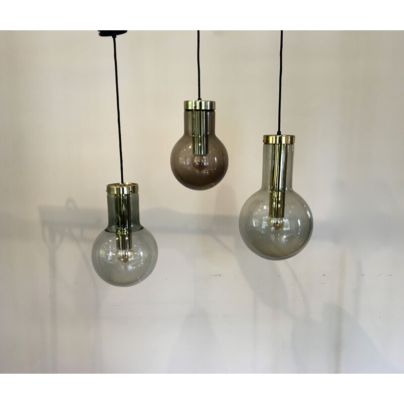 Set of 3 vintage pendant lamps by Raak