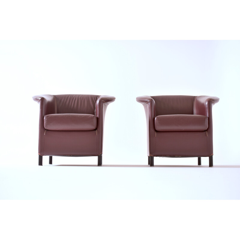 Pair of burgundy armchairs by Paolo Piva 