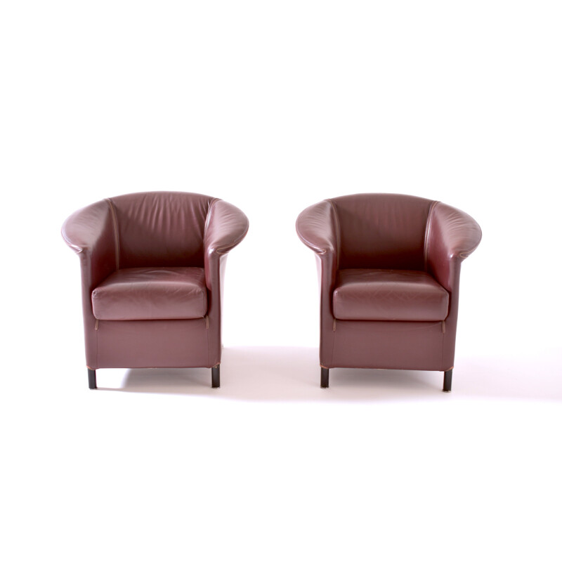 Pair of burgundy armchairs by Paolo Piva 