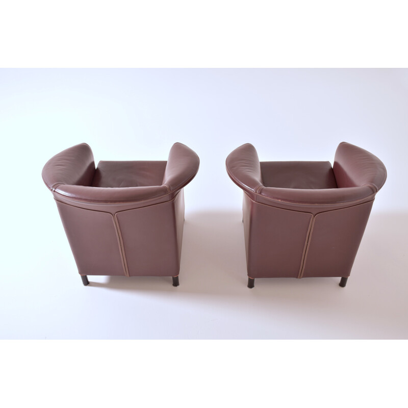 Pair of burgundy armchairs by Paolo Piva 