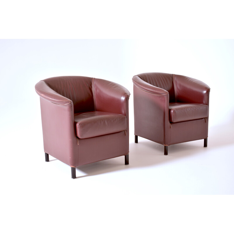 Pair of burgundy armchairs by Paolo Piva 