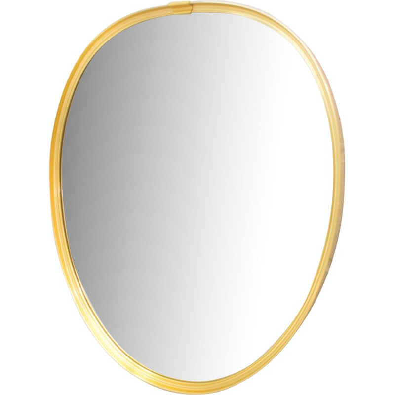 Vintage mirror in golden brass