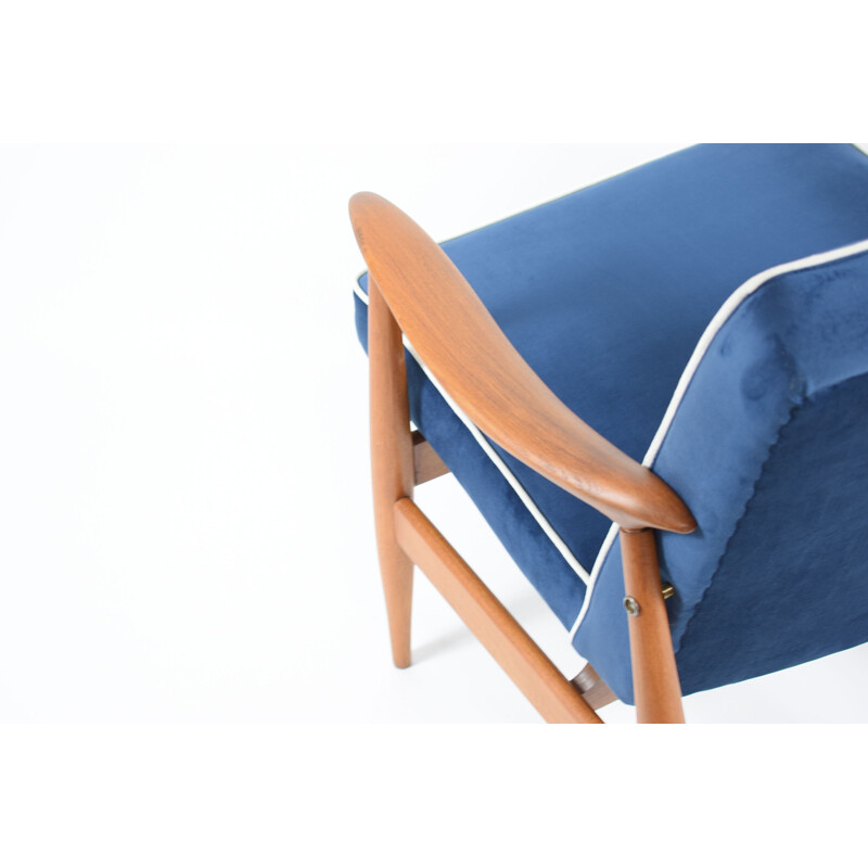Vintage blue velvet Warsaw armchair