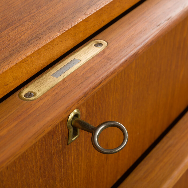 Vintage Danish teak dresser with 8 drawers