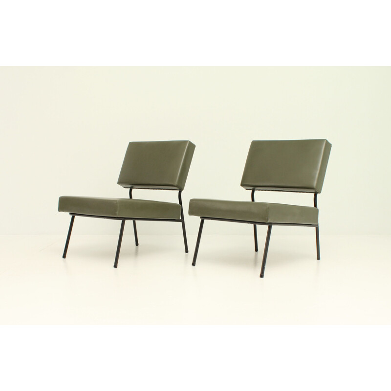 Pair of vintage easy chairs by Guariche for Airborne in metal and green vinyle