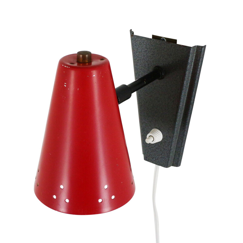 Vintage wall lamp with perforated red shade