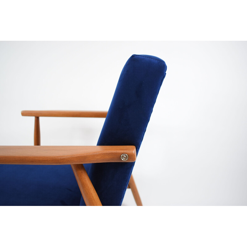 Vintage teak and dark blue fabric armchair 1960