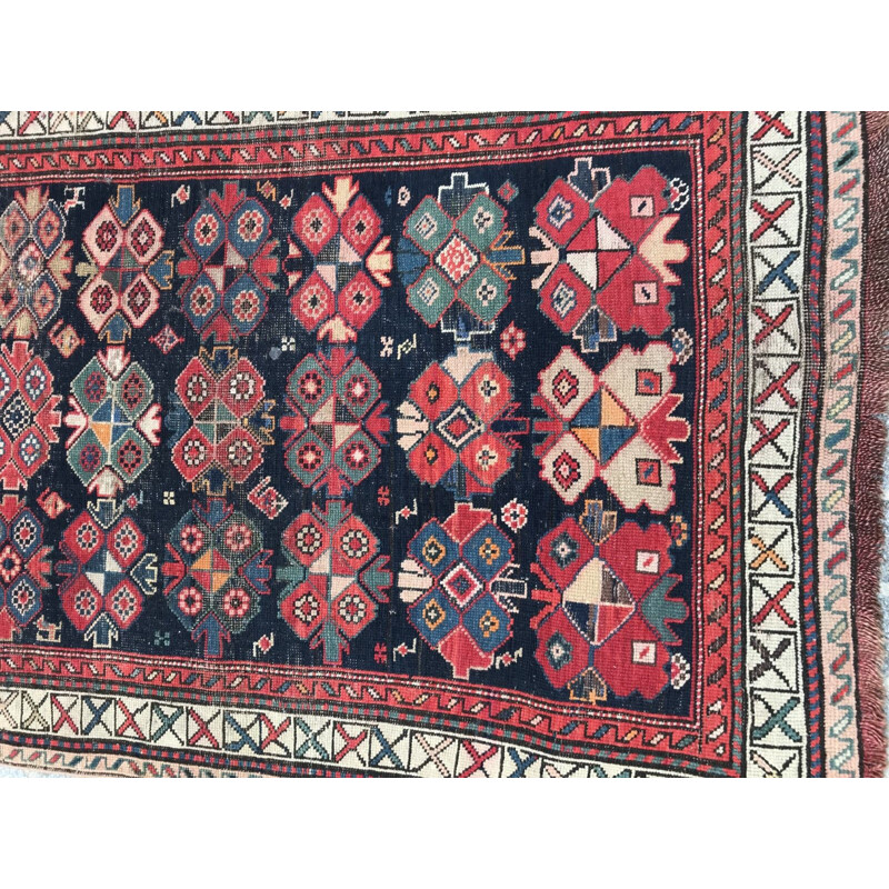 Tapis vintage caucasien en laine avec motifs géométriques