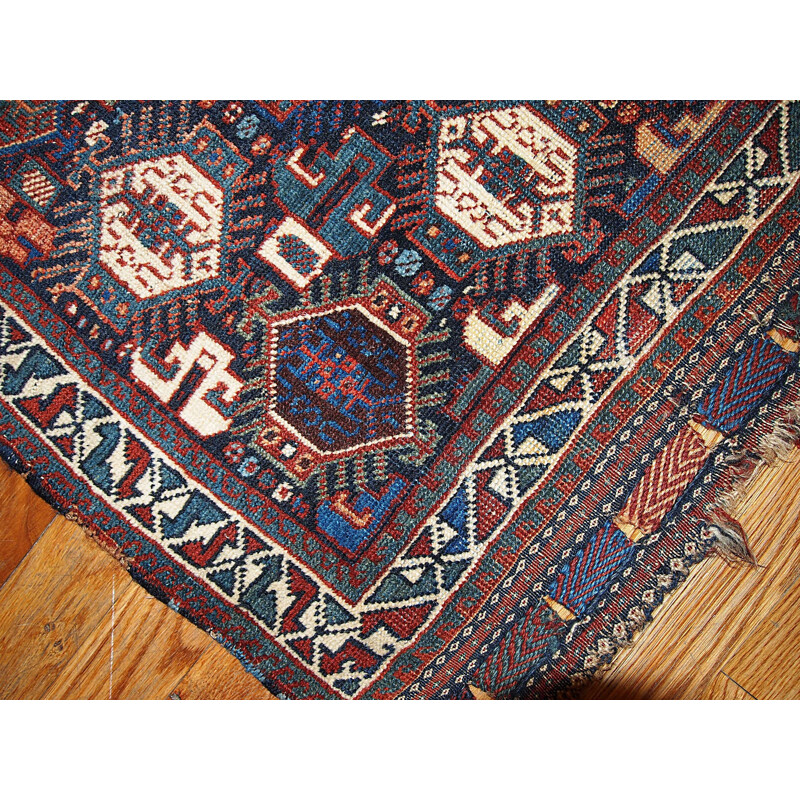 Vintage persian rug in blue and red wool 1930