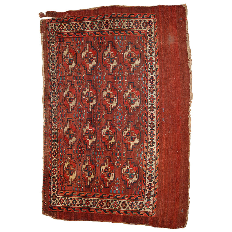 Vintage handmade Turkmen Yomud rug in red wool