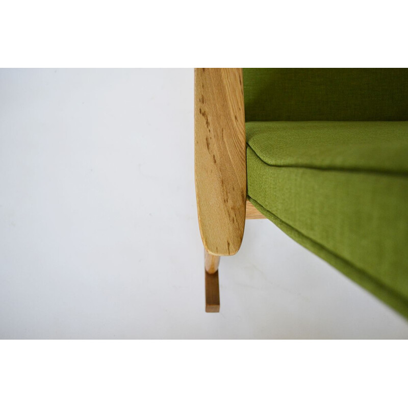 Vintage oak and green fabric rocking chair for Vilniaus Baldų Kombinatas