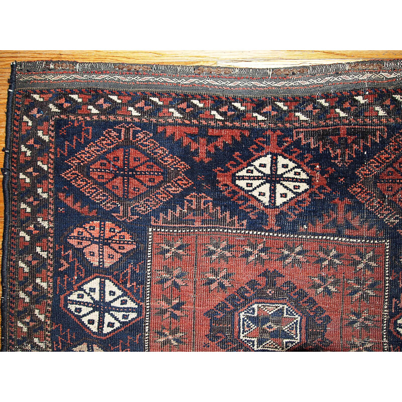 Vintage handmade Afghan Baluch rug in red wool 1930